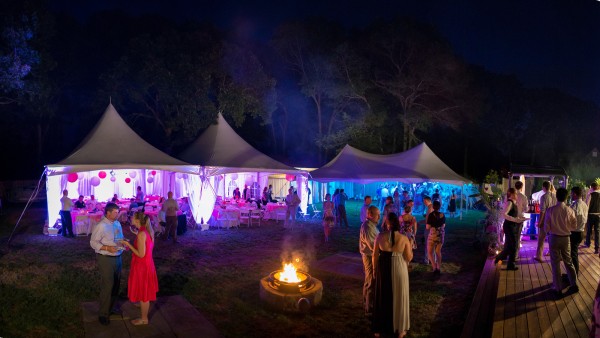 Tents lit up at evening